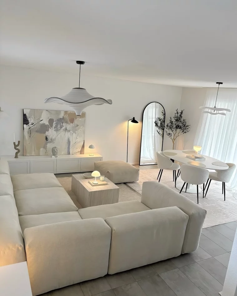 interiuer moderne meubles blancs lustre miroir grand deco salon salle a manger cosy