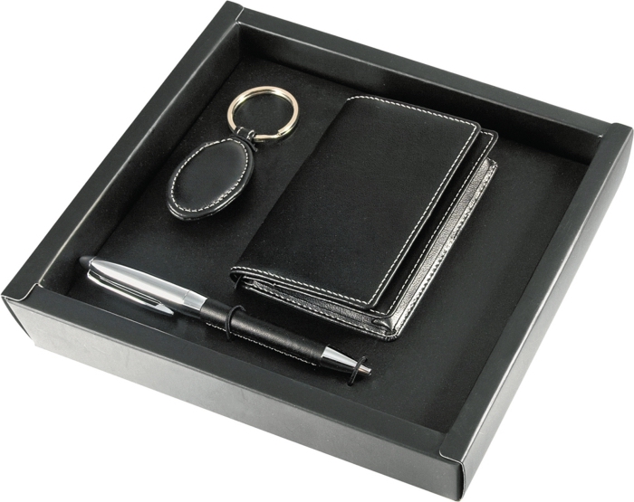 boîte noire avec un set de portefeuille homme élégant combiné avec un stylo et porte-clé de cuir noir à offrir pour la fête des pères