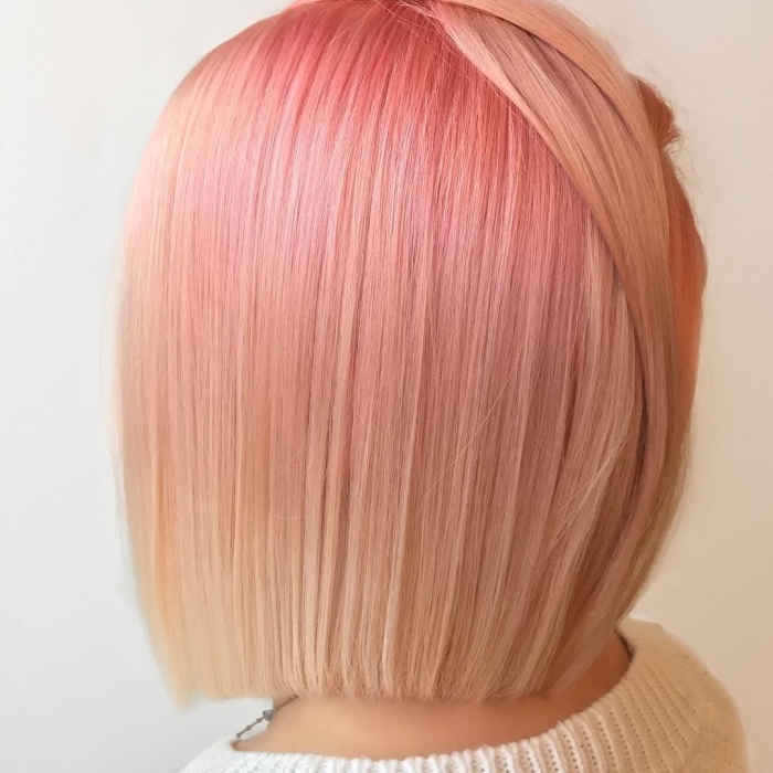 exemple de coloration avec la technique ombré en rose pastel et blond sur cheveux de coupe carré mi-longs