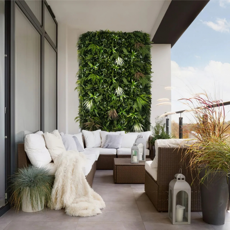 mur vegetal terrasse salon de jardin coussin plante lanterne