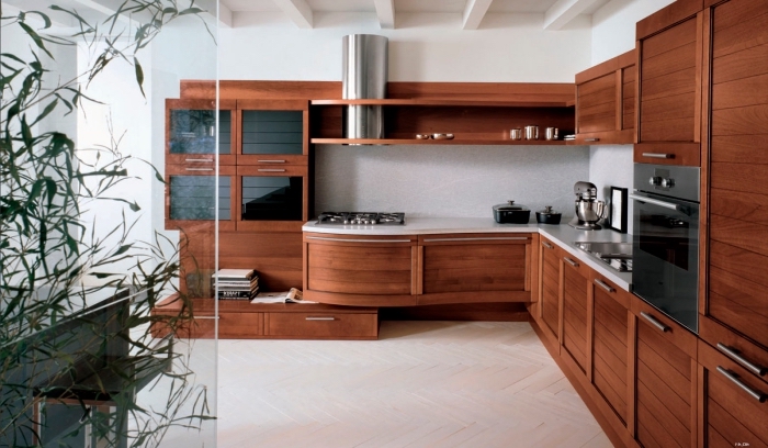 design intérieur dans une cuisine aménagée en L avec meubles de bois foncé et comptoir blanc, idée plantes intérieur