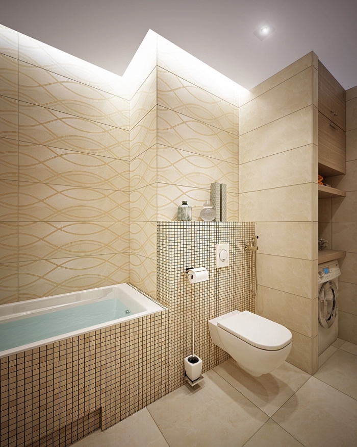 petite salle de bain avec baignoire aux murs en carrelage beige et plafond blanc équipée de baignoire et cuvette en blanc