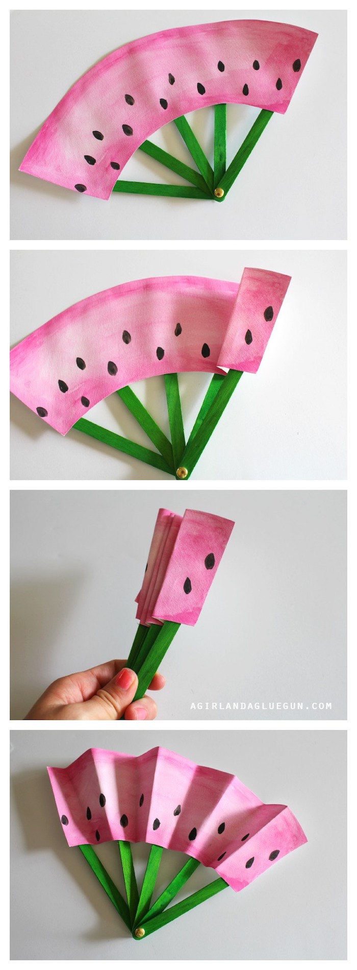 activité manuelle primaire, eventail japonais en papier et batonnets de glace et papier repeint en rose avec touches de peinture imitations pépins
