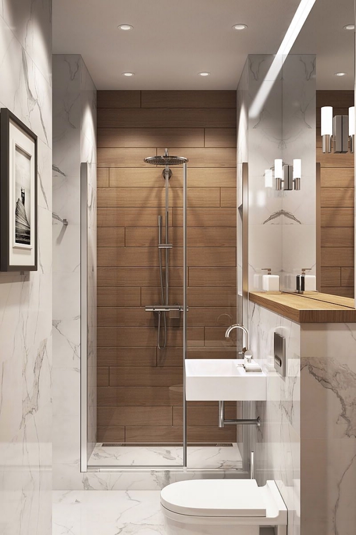 modèle de salle de bain blanche et bois avec murs à design marbre blanc et gris, idée cabine de douche avec pan de mur imitation bois