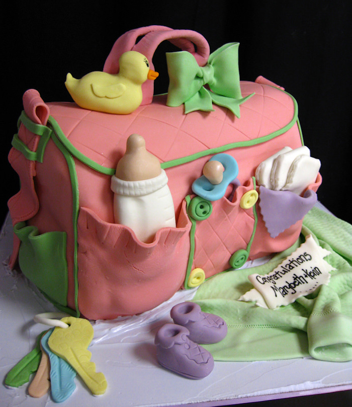 Comment décorer un gâteau pour chaque occasion cool idée beau gateau sac de maman pour le bebe decoration pate a sucre canard biberon petits chaussettes bebe