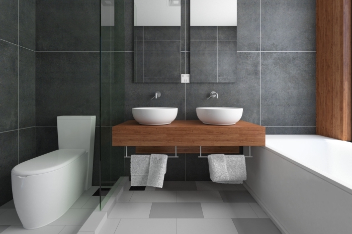 modele carrelage salle de bain gris anthracite sur les murs combiné avec dalles de sol en blanc et gris clair
