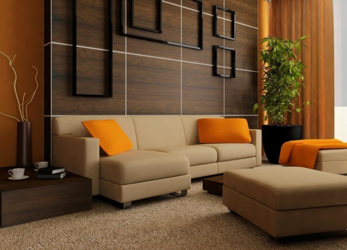 wengé couleur dans un intérieur moderne, coussins déco oranges, panneau mural wengé, sofas taupe