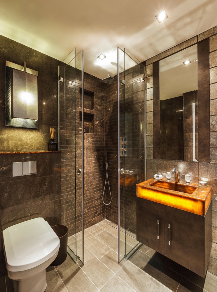 salle de bains sombre, wengé couleur, évier lumineux en pierre naturelle, tuiles mosaiques