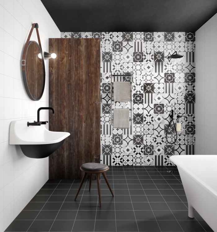 des carreaux de ciment salle de bains à motifs floraux monochrome pour dynamiser le décor sobre en blanc, noir et bois foncé 
