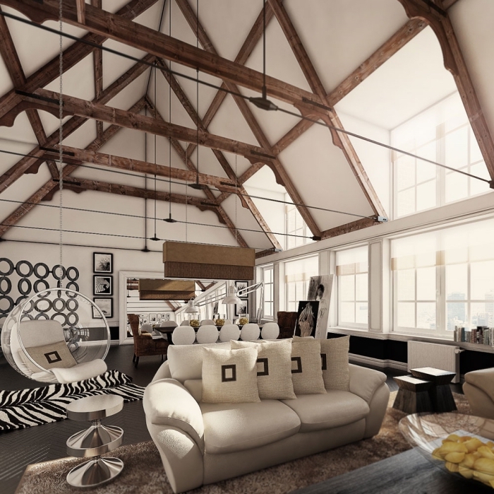 salon moderne avec plafond haut en poutres foncées apparentes avec meubles blanc et noir, idée déco cocooning avec chaise suspendue