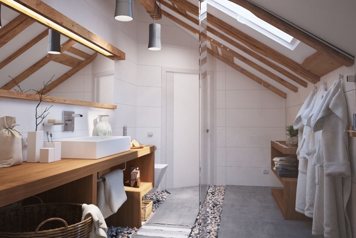 joli modèle de salle de bain contemporain aux murs en carrelage blanc avec poutres de bois exposées et meubles bois