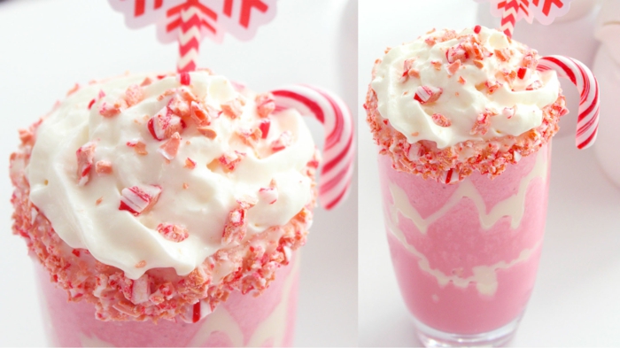 bonbons sucrés sur le topping crème fouettée d'un milkshake rose, présentation milkshake