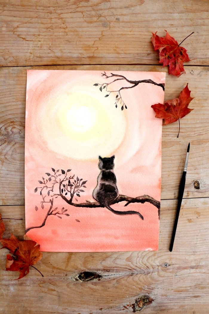 jolie peinture aquarelle représentant un chat noir perché sur une branche, regardant le coucher de soleil, tuto peinture pour apprendre les bases de l'aquarelle