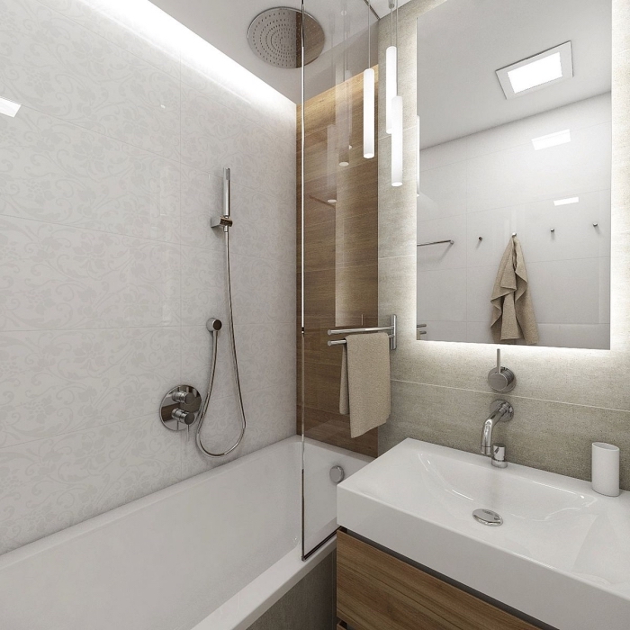 design intérieur stylé dans une petite salle de bain décorée en couleurs neutres avec finitions en métal argent