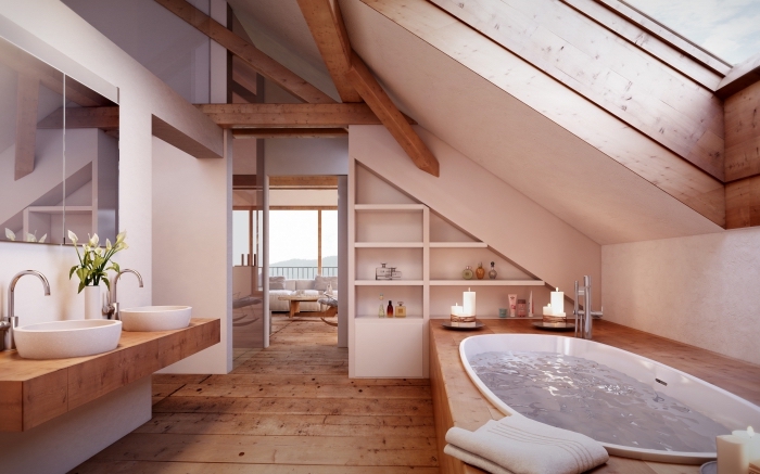 modèle de salle de bain mansardée aménagée en style moderne avec meubles de bois et baignoire avec déco en fausse poutre
