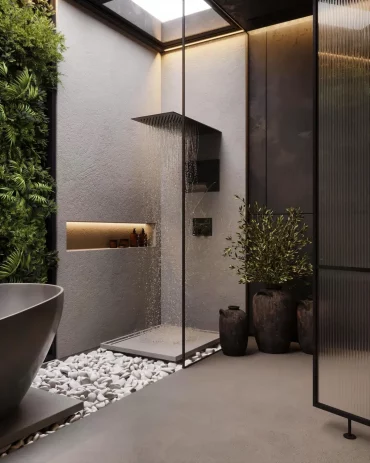 salle de bain zen en gris et noir mur vegetal gravier au sol