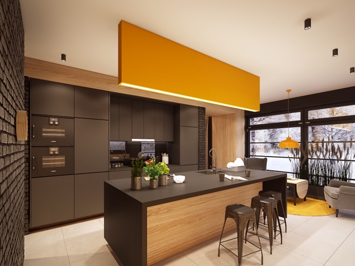 design intérieur moderne dans une cuisine équipée avec ilot et meubles en noir mate, exemple de déco en noir et bois avec accents en jaune