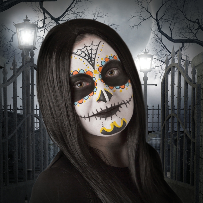 fille maquillage halloween squelette, cheveux noirs, visage blanchi, peinture sur visage colorée et esthétique