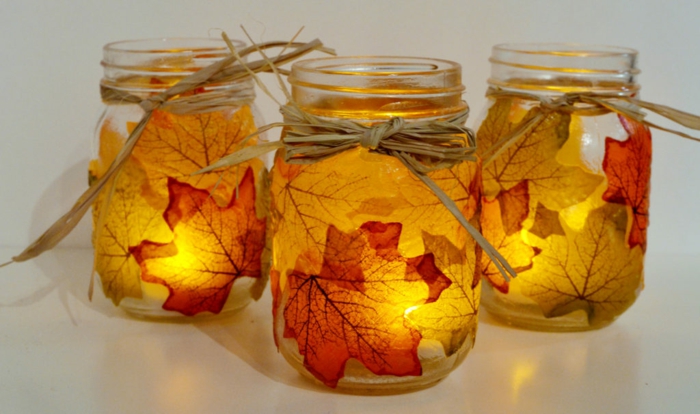 deco mariage champetre a faire soi-meme, bocaux en verre illuminés et décorés de feuilles d'automne