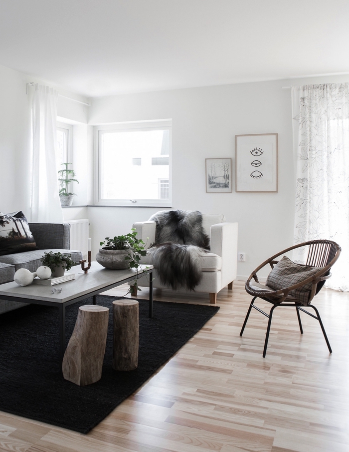 deco salon scandinave en blanc et gris aux accents en bois, ambiance épurée et cosy dans un salon nordique moderne 