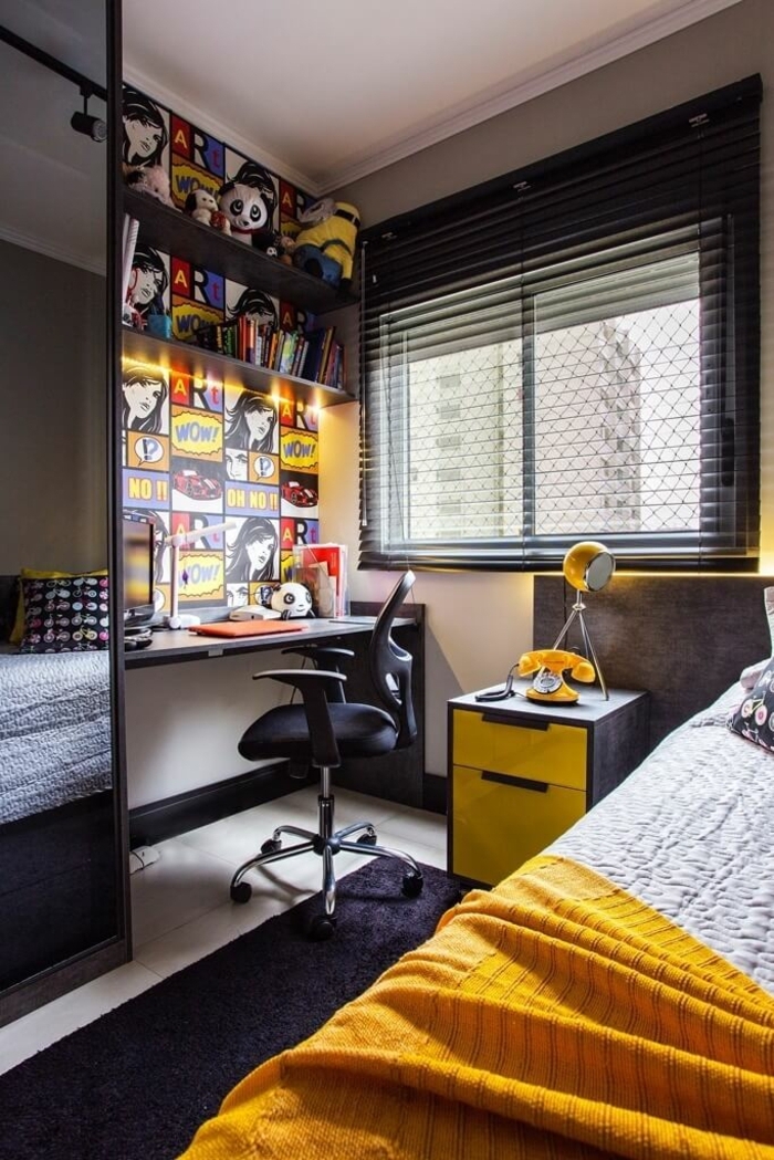 chambre enfant en noir et jaune, chaise pivotante, mur anthracite, téléphone jaune, bureau noir suspendu