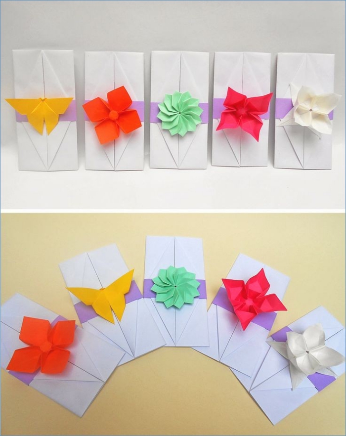 jolie pochette origami pour accueillir un faire-part ou une invitation de mariage, décorée avec une fleur en origami en papier de couleur
