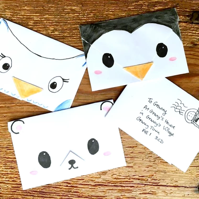 pliage origami enveloppe idee pour les petits avec un dessin de pinwuin