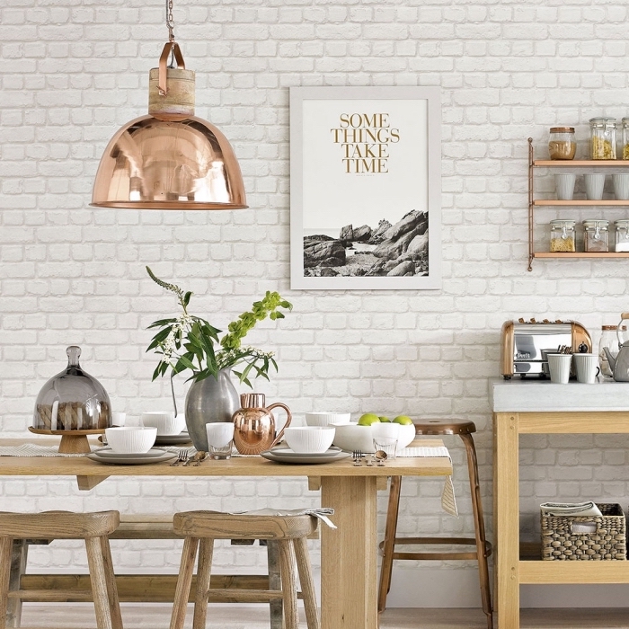 modèle de cuisine équipée avec coin repas, déco murale dans une cuisine blanc et bois, cuisine avec mur à effet briques blanches