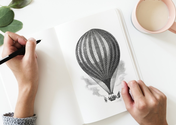 Tatouage ballon à voler, le plus beau dessin de tatouage artistique, dessin dans un sketch book mignonne photo