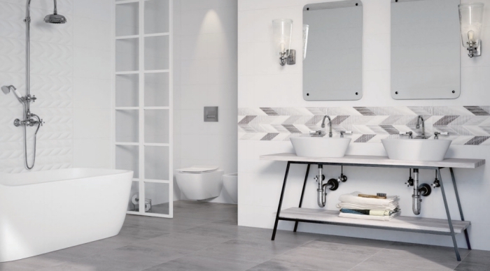 modèle de carrelage salle de bain à relief, exemple de salle de bain avec baignoire et séparation pièce en blanc et verre
