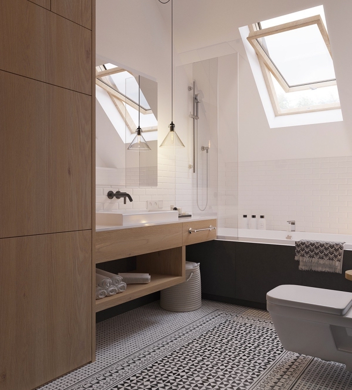 faience salle de bain en blanc, modèle de baignoire blanc et noir pour petit espace, idée déco moderne en blanc et noir avec bois
