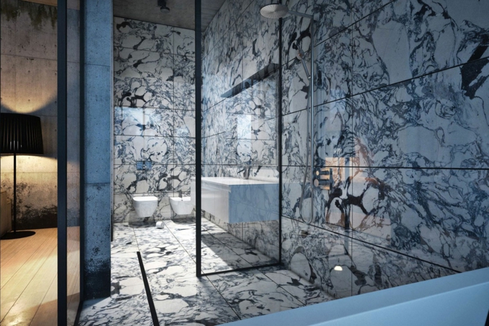 salle de bain en marbre veiné blanc, vasque blanche rectangulaire, parois au profilé noir