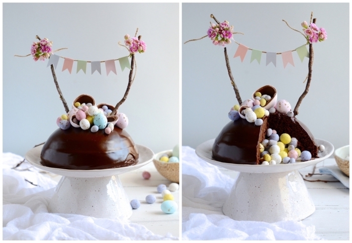 gâteau-surprise-pour-pâques-au-chocolat-oeufs-au-chocolat-gâteau-dôme-décor-bannière-fanions-présentoir-gâteau-céramique-blanc pinata cake au chocolat en forme de dôme recouvert de ganache au chocolat qui renferme des œufs en chocolat, décoré avec une bannière rustique