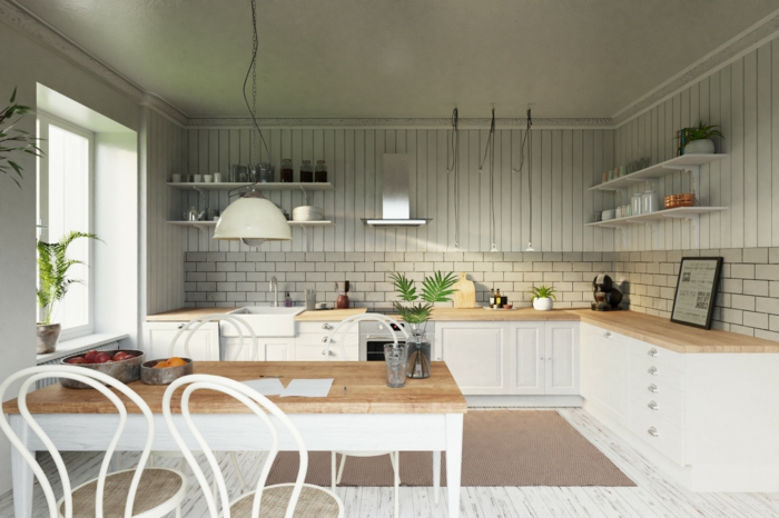 cuisine design scandinave, chaises rondes, table rectangulaire, sol en parquet blanchi, petite cuisine en l