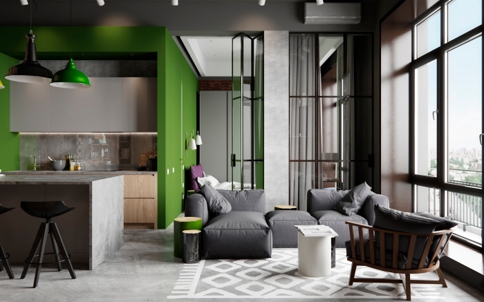 comment aménager petite cuisine style industriel avec mur vert, déco salon gris foncé avec pan de mur vert anglais