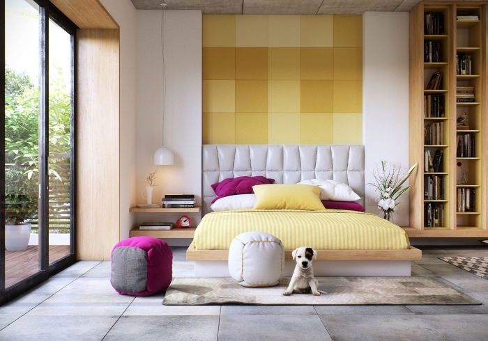 exemple de chambre à coucher contemporaine avec murs blancs et plancher gris, modèle revêtement murale pan de mur en jaune moutarde