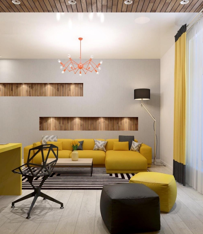 exemple de deco salon gris moderne, idée rangement mural avec niches de bois et éclairage led, lustre corail