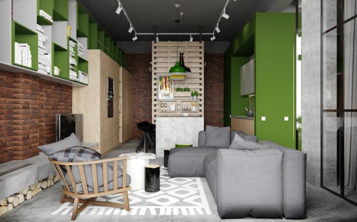 aménagement petit studio de style industriel aux murs à design briques, meubles rangement blanc et vert, couleur vert anis dans la déco