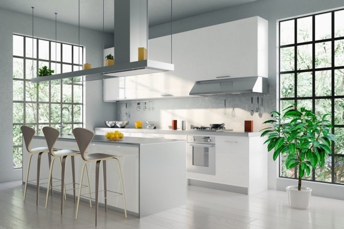 modele de cuisine moderne aux murs gris clair, déco de cuisine avec îlot en blanc et gris, suspension au dessus îlot avec rangement ouvert
