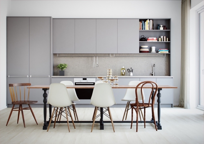 modèle de cuisine contemporaine aux murs blancs avec équipement en gris, déco de cuisine ouverte vers salle à manger