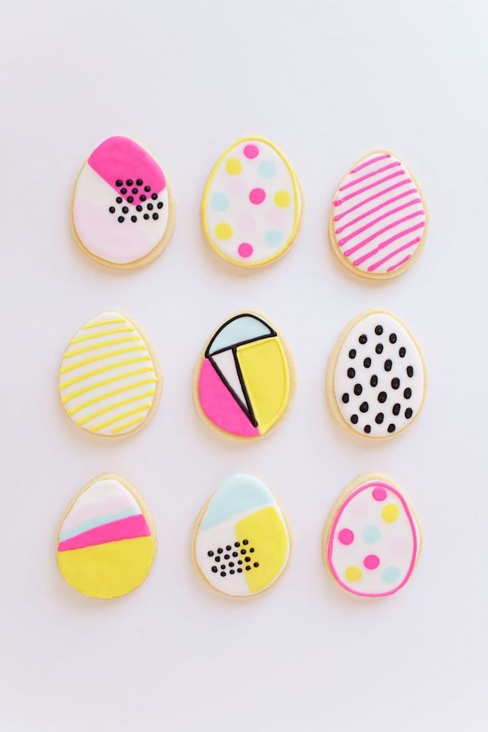 Biscuits décorés joliment avec pate a sucre coloré aux couleurs neon modernes, carte joyeuses pâques, belle image joyeuses paques 