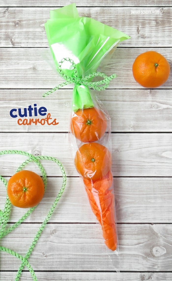 carotte orange fabriqué avec clémentines et papier léger décoratif mis en cellophane
