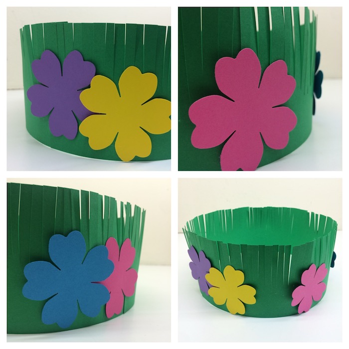 comment fabriquer une couronne de fleurs en bande de papier à franges avec une fleur coloré décoratif collée dessus