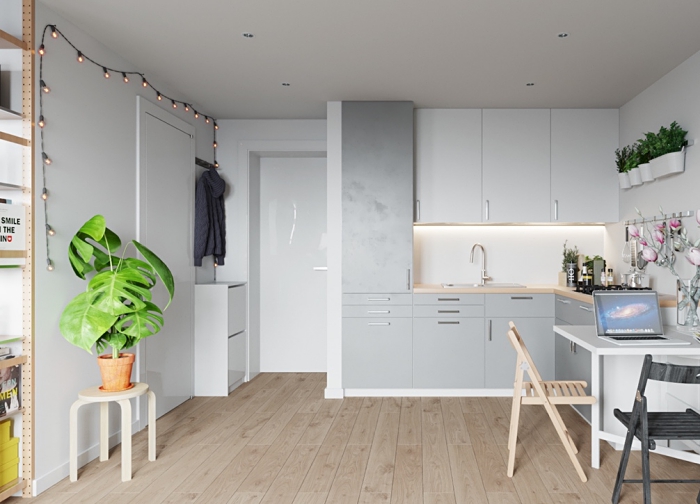 aménagement petite cuisine blanche avec plan de travail en bois clair, déco cuisine minimaliste avec armoires gris clair