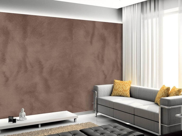 ambiance relaxante dans un salon gris avec mur à texture sable, idée peinture tendance sablée de nuance terreuse