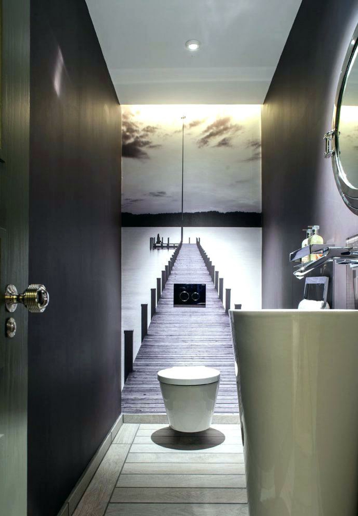 idee deco toilette en gris et blanc, poster mural trompe l'oeil, vasque colonne, miroir rond, peinture toilette noire