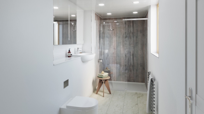 agencement petite salle de bain aux murs en peinture blanche avec cabine de douche aux panneaux effet bois