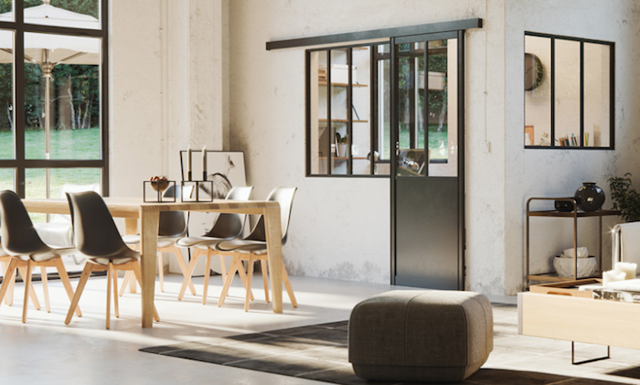 photo d'une cuisine séparée avec verrière atelier et porte en aluminium noir dans grand espace loft
