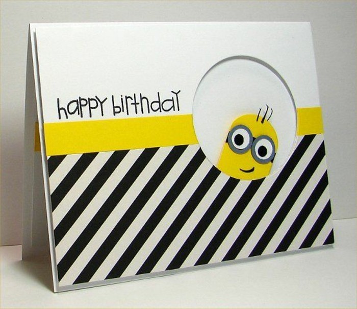 carte anniversaire enfant sur le thème minions en papier blanc, noir et jaune, carte de voeux minions à faire soi même