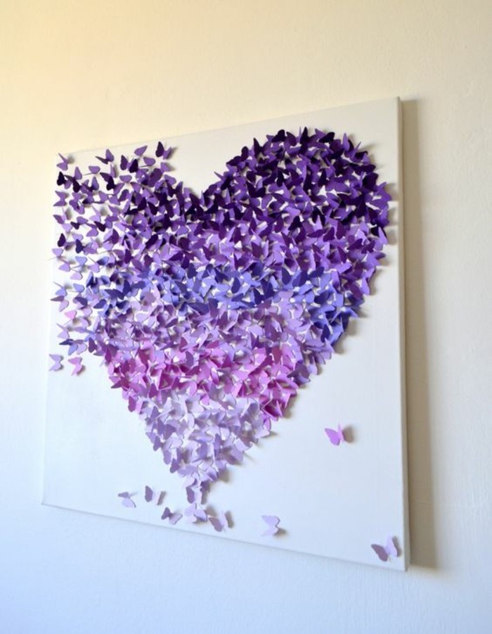 grand coeur créé avec papillons en papier plié, tableau pour salon joli avec figures 3d